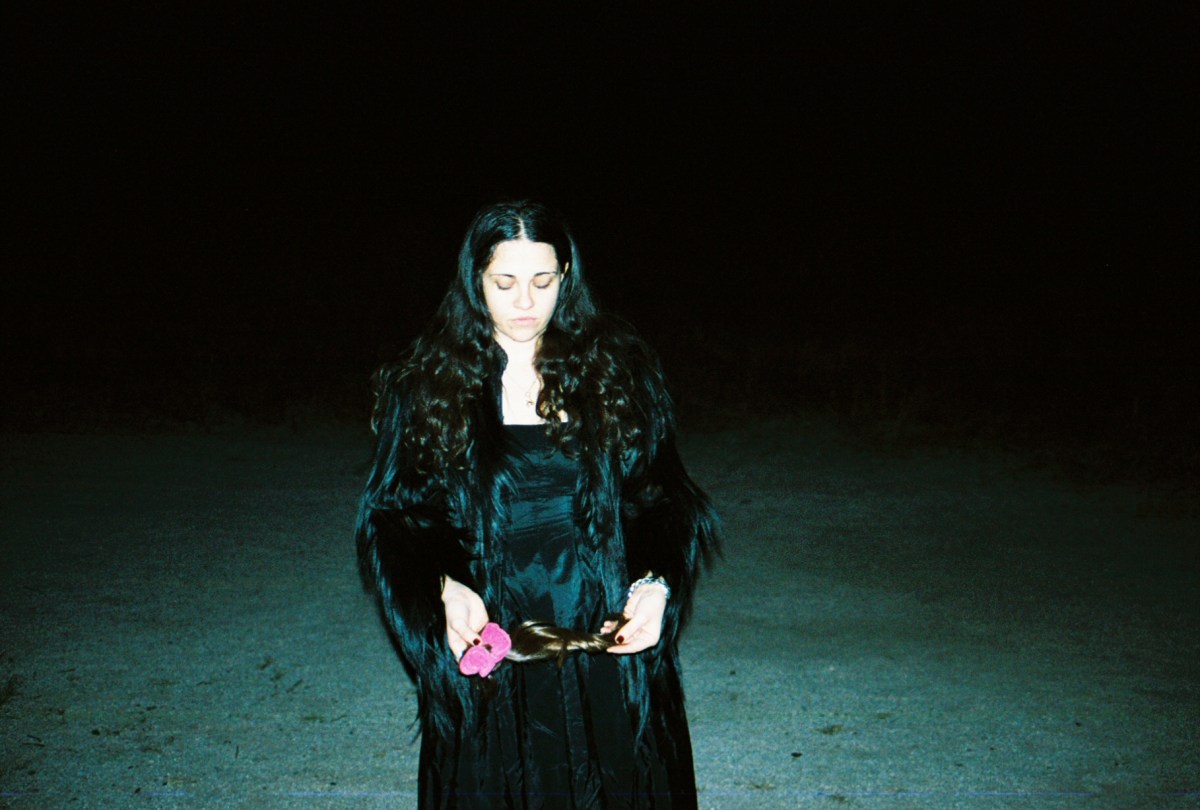 CHELSEA MARKS AND HER CHILDHOOD PONYTAIL.